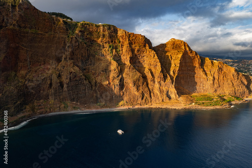 Rocky cliff near blue sea