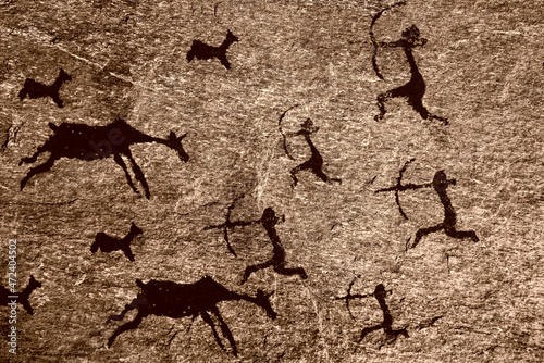 Obraz na plátně Cave art seamless pattern made of ancient wild animals, horses and hunters