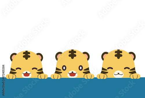 ひょっこり顔を出しているトラの年賀状向け素材