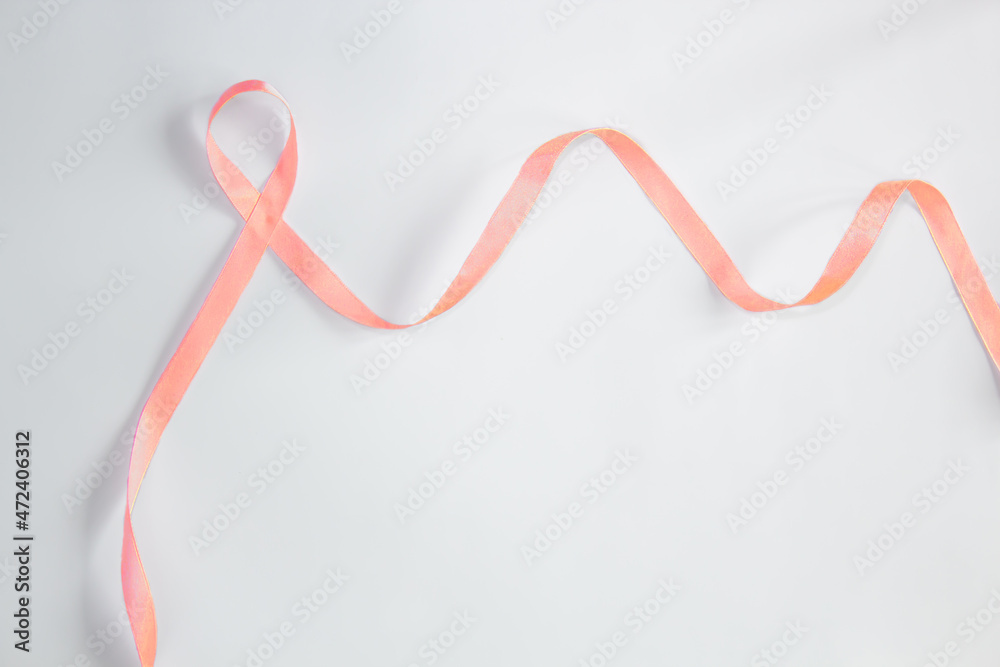 Fototapeta premium Peace ribbon on white background with copy space for text and an Endometrial or uterine campaign.
