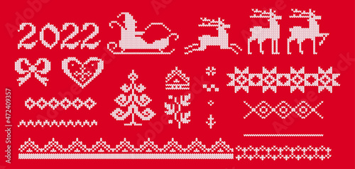 2022 Red knitted santa claus reindeer sleigh. Seasonal decoration