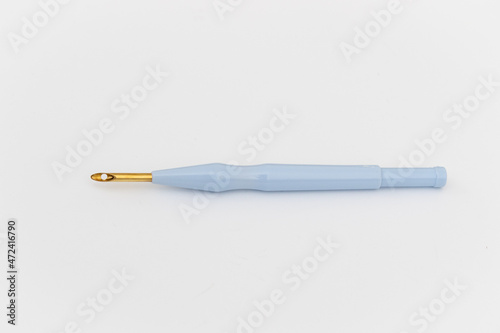 Needle for carpet embroidery in punch needle technique on white background