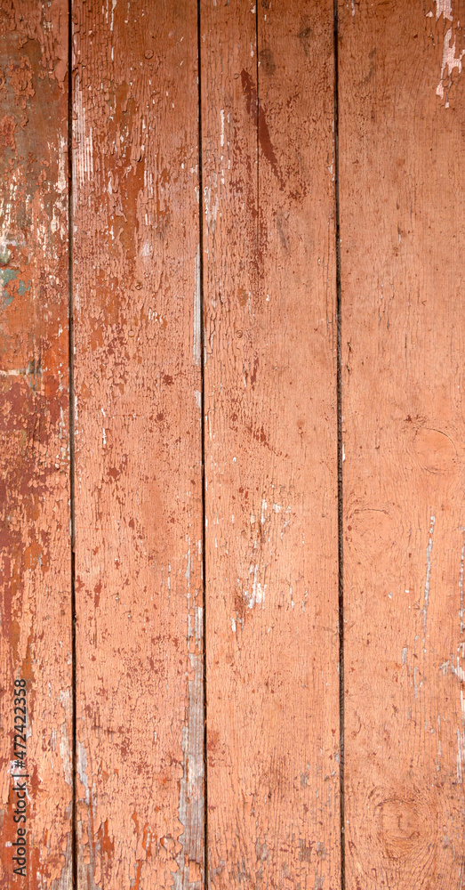 Fototapeta premium Old grey and red wooden background with cracks and scratches in vintage style