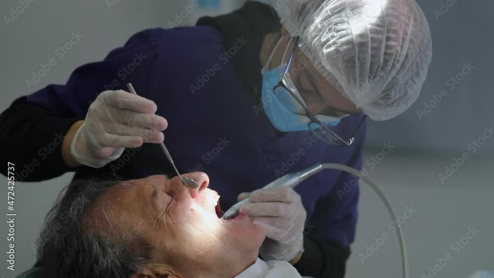 Dental clinic procedure. female dentist working Dental clinic procedure. female dentist working