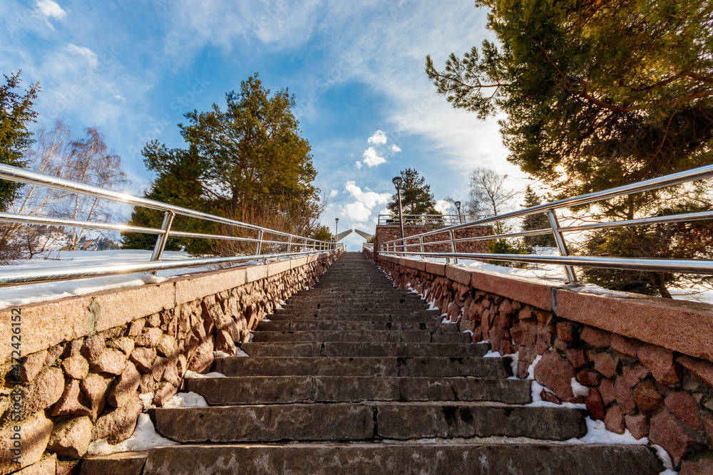 Long staircase on the anti-mudflow dam Medeu. Famous tourist place in Almaty.