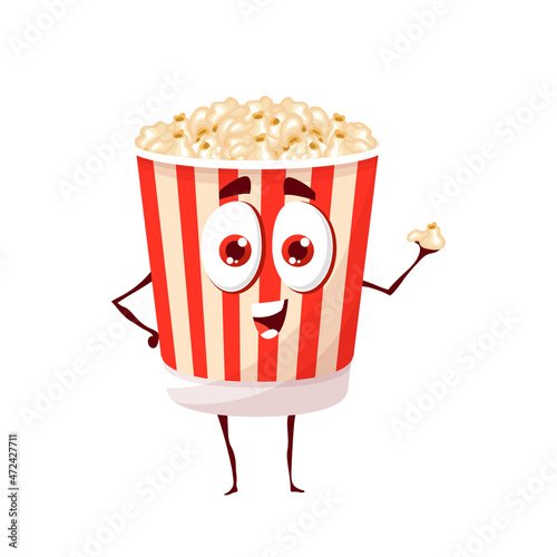 Cartoon funny popcorn character. Vector pop corn bucket with cute smiling face holding snack piece in hand. Fast food for cinema, funny personage with positive emotion, snack in striped paper box