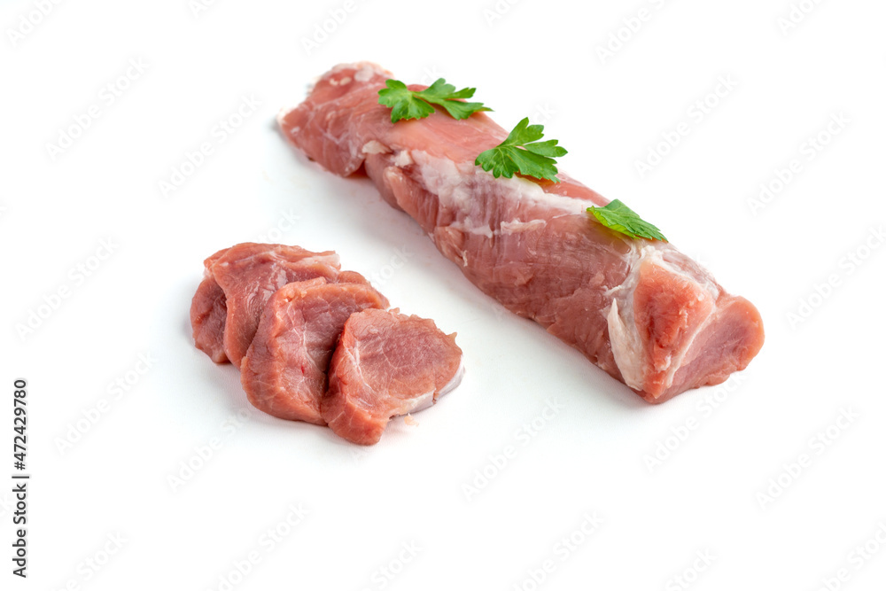 Raw pork tenderloin meat on a white background Raw pork tenderloin meat on a white background