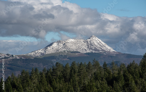 monte Anboto nevado con cielo nublado  photo