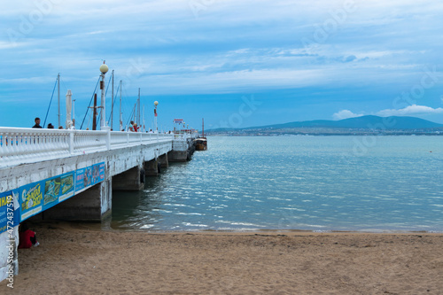 Gelendzhik Russia, black sea and embankment with blue sky.