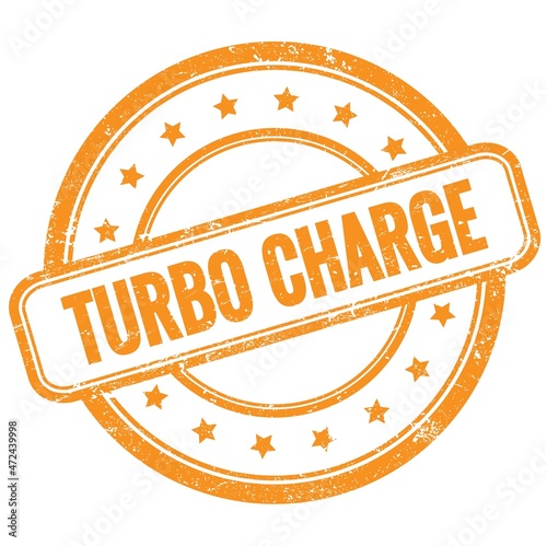 TURBO CHARGE text on orange grungy round rubber stamp.