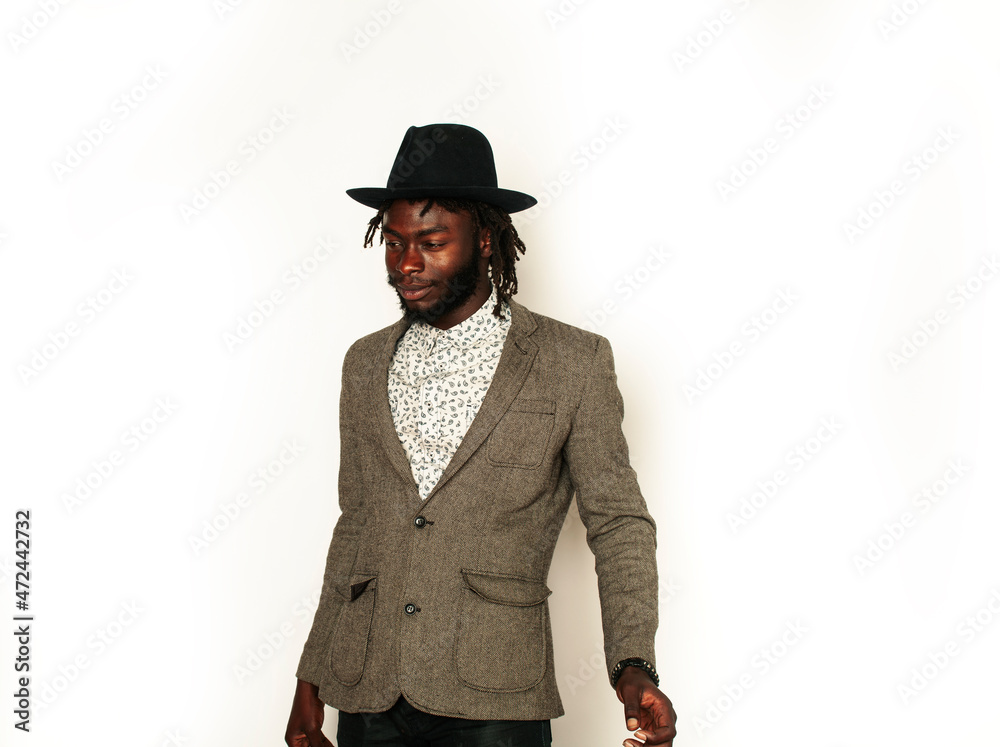 young handsome african american man gesturing emotional posing isolated on white background stylish hipster. youth concept