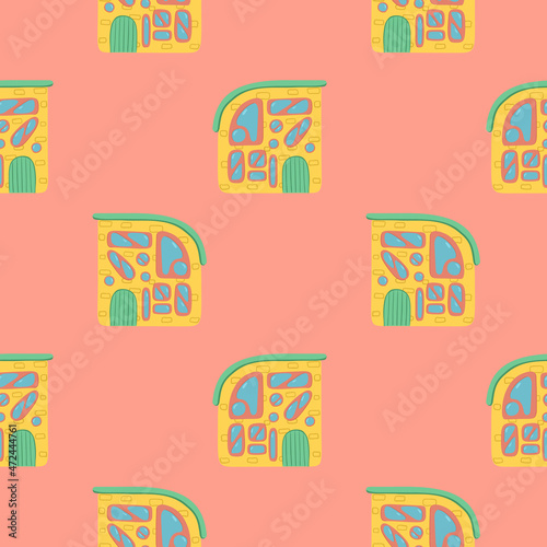 A pattern of multi-colored flat art nouveau houses. House with unusual windows. EPS 10 without transparencies.
