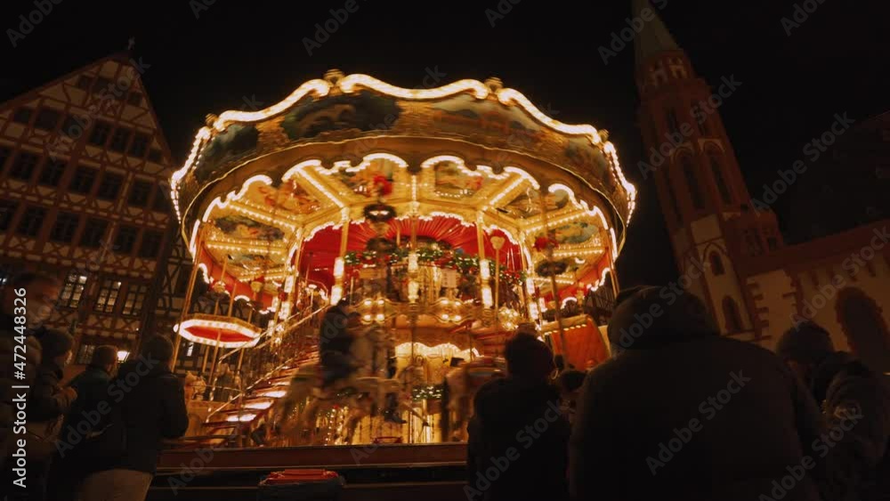 Christmas market in Frankfurt am Main with the carousel in the evening