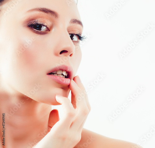 young sweet brunette woman close up isolated on white background  perfect pure innocense beautiful