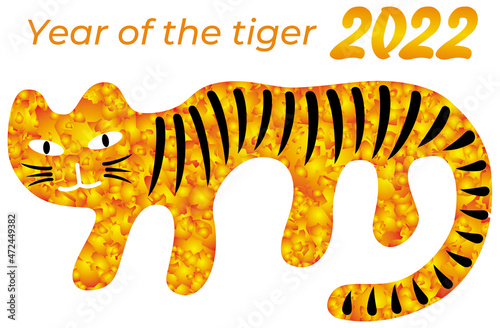 The golden cartoon tiger in yellow anf orange colors. Sparkling gradients. Inscription - year of tiger 2022. Vector graphics