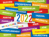 Carte de vœux 2022 montrant une multitude d’étiquettes de couleurs, présentant l’ensemble des vœux à souhaiter pour la nouvelle année.
