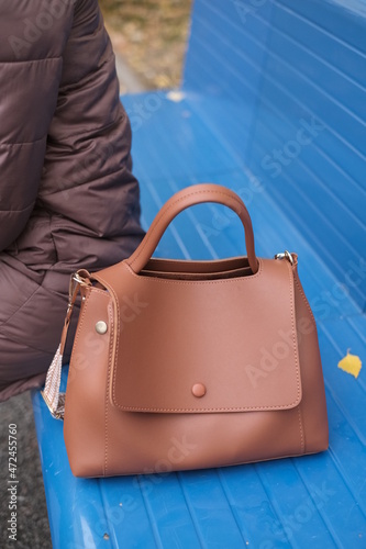 person holding a suitcase