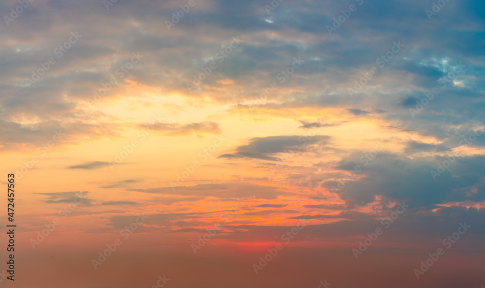 Majestic real sunrise sundown sky background with dramatic colorful clouds