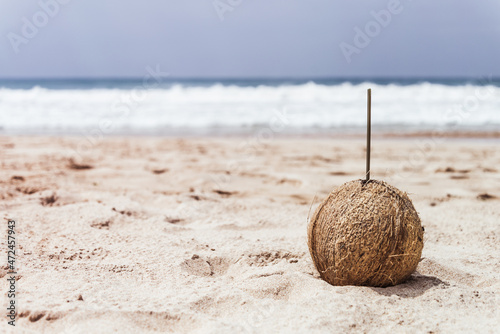 Drinking fresh coconut on a beach vacation