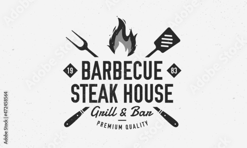 Barbecue logo. Steakhouse logo, poster template with grill fork, spatula and fire flame. BBQ poster design for restaurant, Steakhouse. Vector illustration