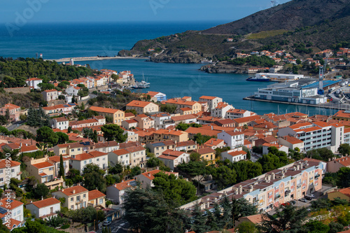 Fototapeta Naklejka Na Ścianę i Meble -  Aerial view of Port Vendres town with its church and trawler at dock, Mediterranean sea, Roussillon, Pyrenees Orientales, Vermilion coast, France