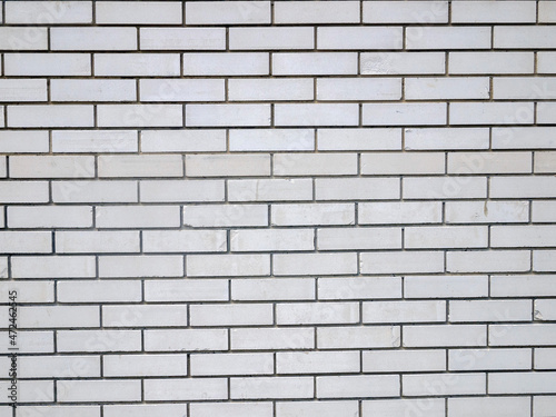 White brick wall. Shabby empty surface. Neutral background.