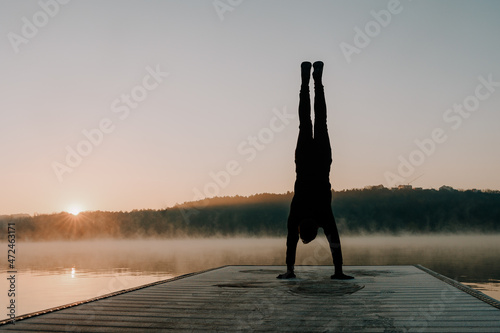 Man doing yoga in the morning