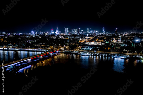 Night city skyline background. Aerial view of Warsaw capital cit