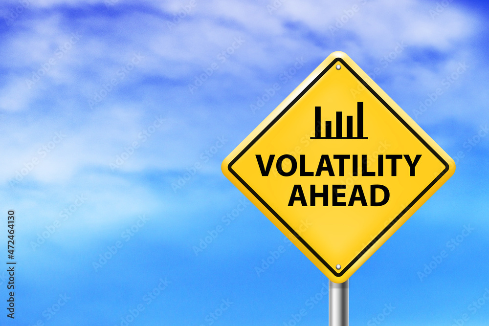 Volatility ahead warning sign on sky background Volatility ahead warning sign on sky background