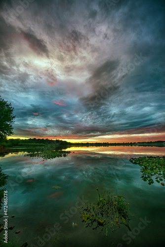 sunset over lake, vertical image