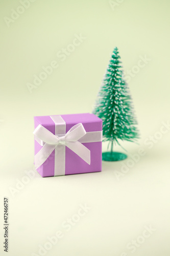 surprise gift box with white ribbon © Kate Pasechnik