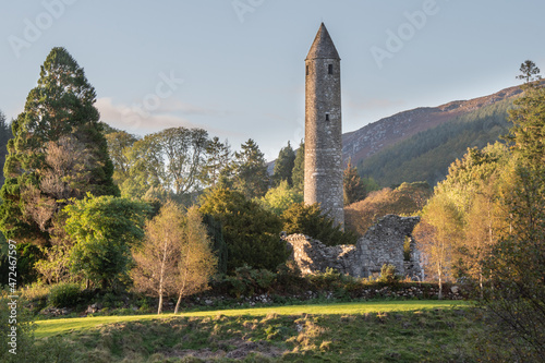 Glendalough Round tower, built of mica-slate interspersed with granite . photo