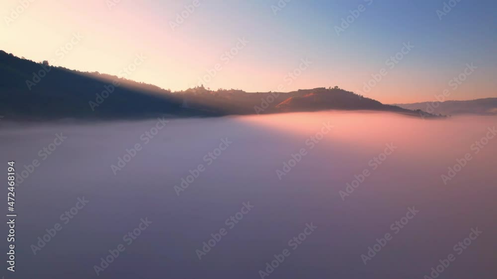 4K Drone Flying in the clouds. Flying through the clouds during sunrise, Aerial top cloudscape view from drone
4K Drone Flying in the clouds. Flying through the clouds during sunrise, Aerial top cloudscape view from drone