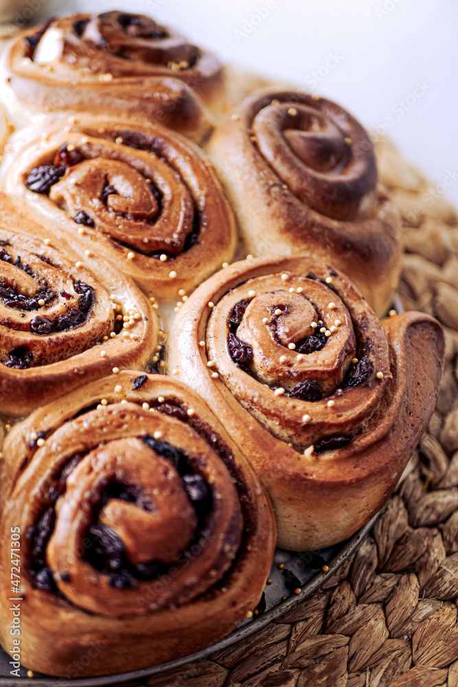 Homemade cinnamon rolls made from yeast dough, Chelsea rolls with cinnamon and raisins. Homemade snail buns Homemade cinnamon rolls made from yeast dough, Chelsea rolls with cinnamon and raisins. Homemade snail buns