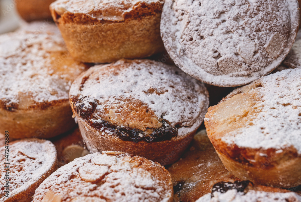 Piles of delicious festive mince pies on sale at Bath Christmas Market. Piles of delicious festive mince pies on sale at Bath Christmas Market.
