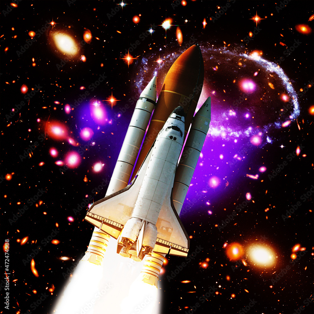 Space shuttle launches to stars. The elements of this image furnished by NASA. Space shuttle launches to stars. The elements of this image furnished by NASA.