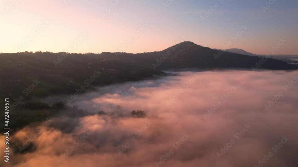 4K Scenic flight over beautiful mountain scape with bright sky and fog clouds on summer sunrise. Flight above clouds
4K Scenic flight over beautiful mountain scape with bright sky and fog clouds on summer sunrise. Flight above clouds