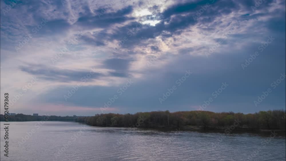 A magnificent sunrise view from the high bank to the misty river. The feeling of freshness and delight is conveyed through the unforgettable shades of the colorful morning sky A magnificent sunrise view from the high bank to the misty river. The feeling of freshness and delight is conveyed through the unforgettable shades of the colorful morning sky