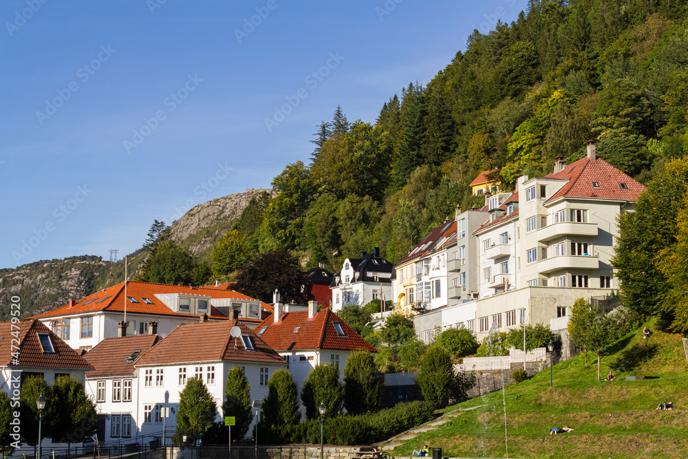 People enjoying the sun on Bergen hillside, Norway People enjoying the sun on Bergen hillside, Norway