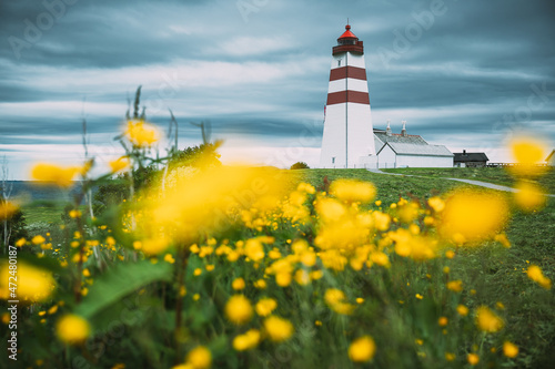 Alnesgard, Godoya, Norway. Old Alnes Lighthouse In Summer Day In Godoy Island Near Alesund Town. Alnes Fyr photo