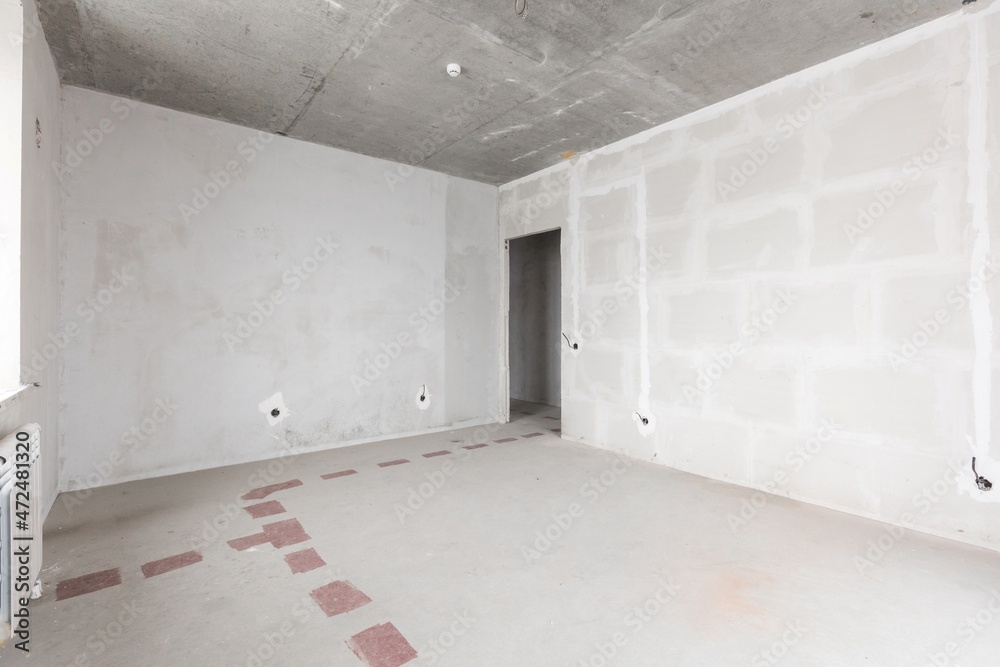 Obraz premium interior of the apartment without decoration in gray colors