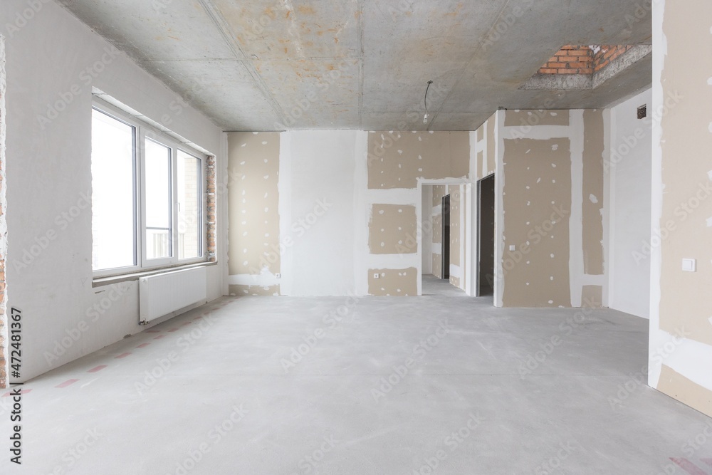 Fototapeta premium interior of the apartment without decoration in gray colors