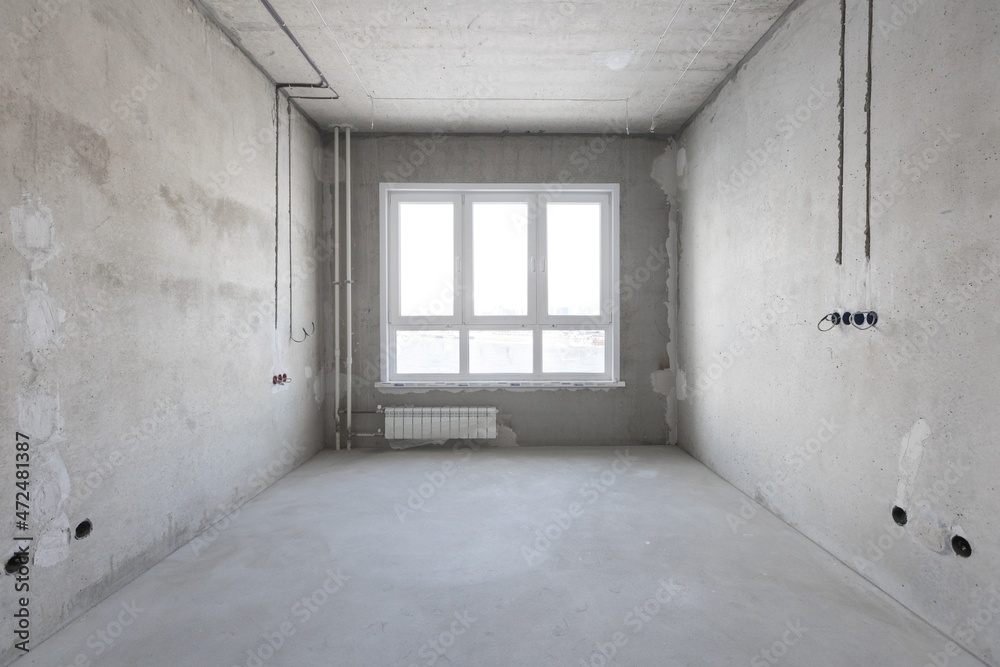 Obraz premium interior of the apartment without decoration in gray colors