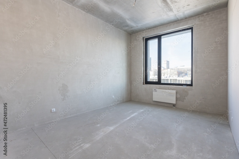 Obraz premium interior of the apartment without decoration in gray colors