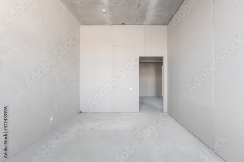 interior of the apartment without decoration in gray colors