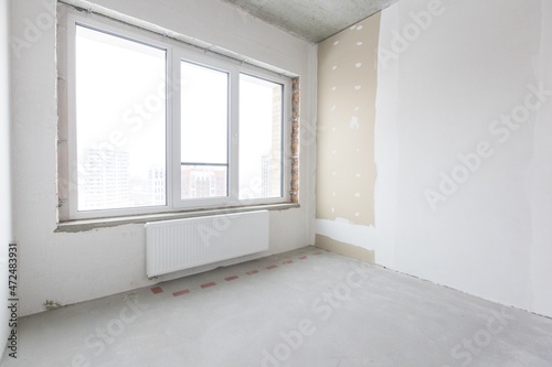 interior of the apartment without decoration in gray colors