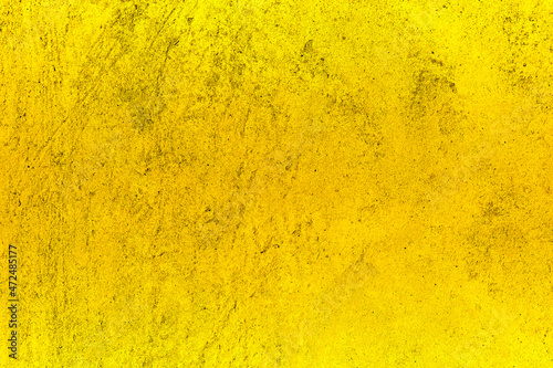 Abstract yellow concrete wall background with grunge texture