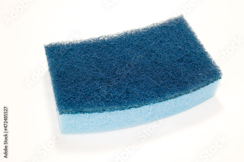 Dishwashing sponge with a soft and a rough part