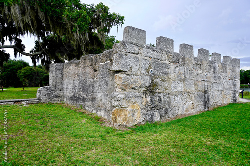 Fort Frederica National Monument, Georgia. Archaeological remnants of fort magazine built by James Oglethorpe to protect the southern boundary of the British colonies from Spanish. River and cannon. photo