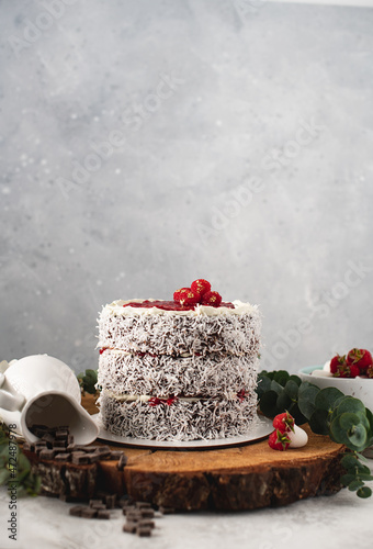 Australian cake with chocolate, coconut and berries